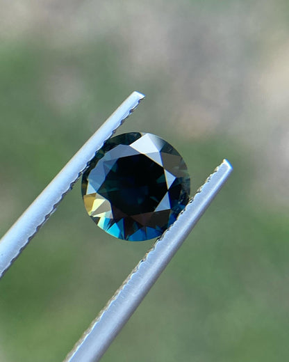 038- Dark Green Blue with Yellow edge - Australian Sapphire 1.64ct ROUND CUT