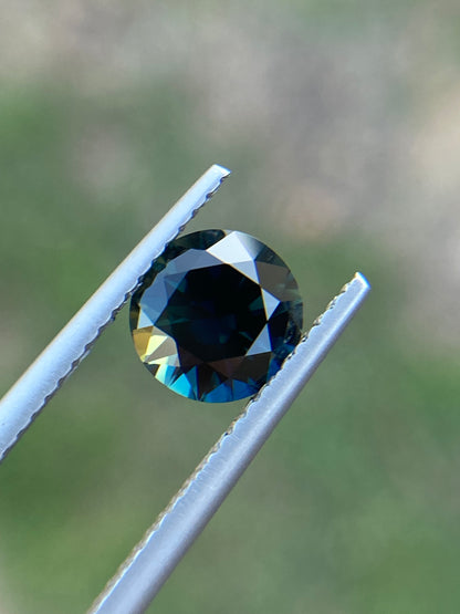 038- Dark Green Blue with Yellow edge - Australian Sapphire 1.64ct ROUND CUT