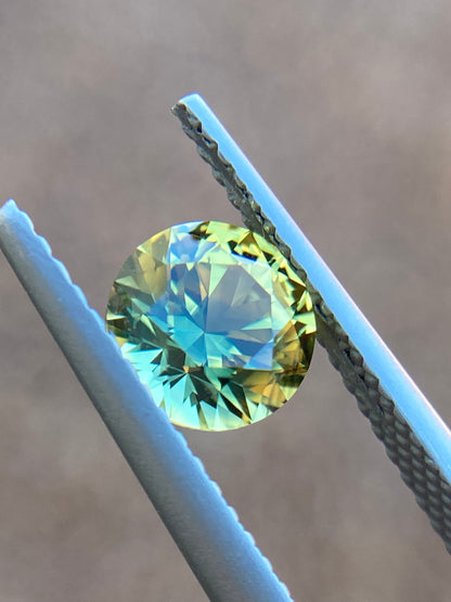 036- Yellow Parti Australian Sapphire 1.3ct ROUND CUT
